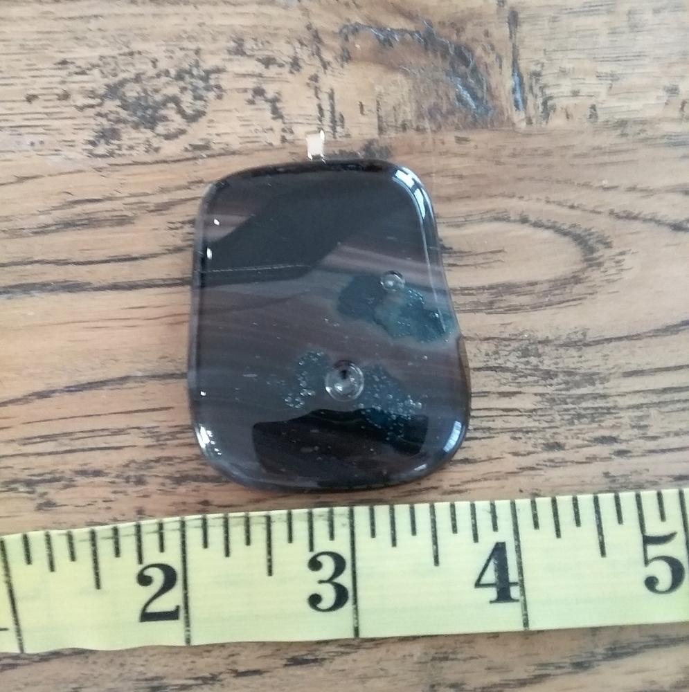Custom glass pendant in browns and blues